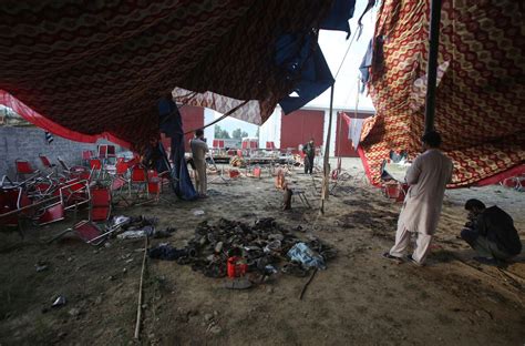 A bomb at a political rally in northwest Pakistan kills at least 35 people and wounds more than 100